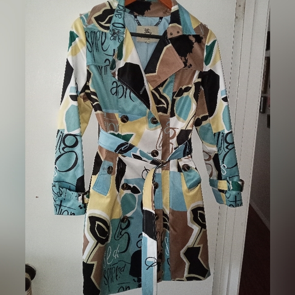 Burberry ladies funky graphic trench coat. Size 4